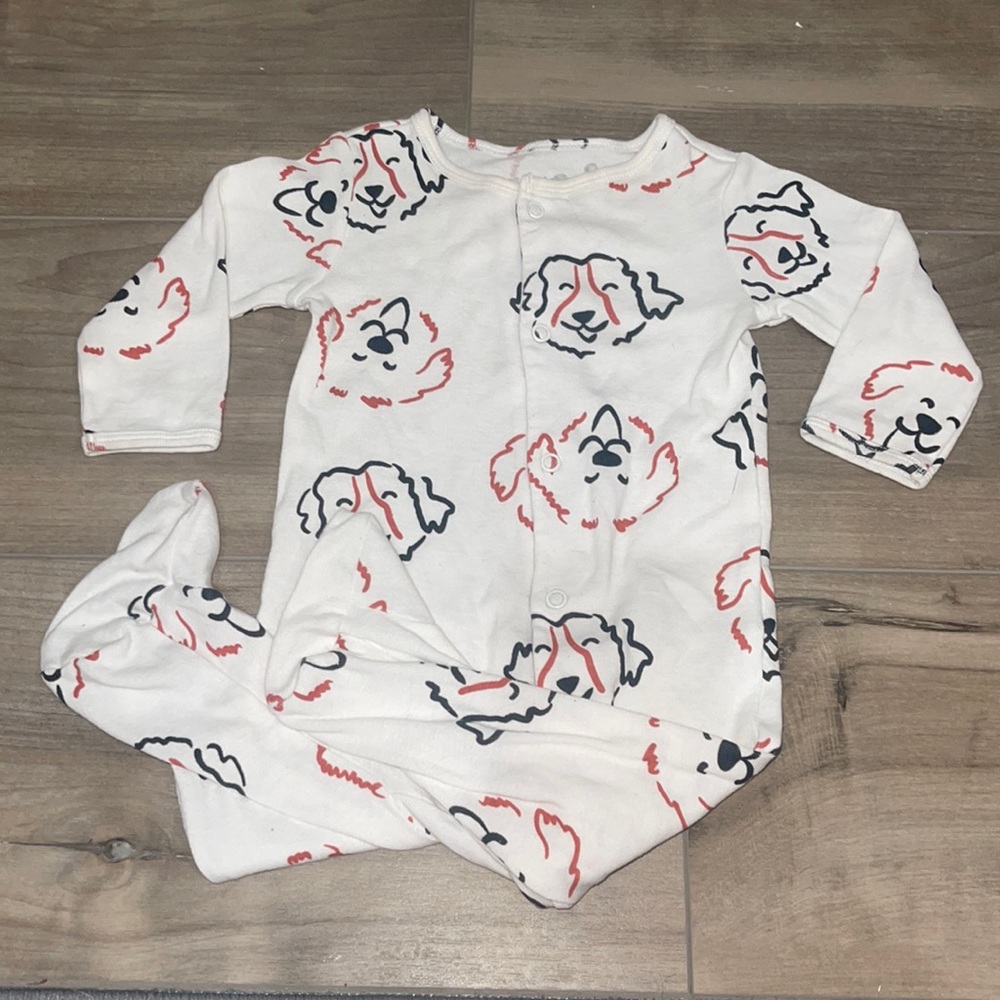 baby footsies with dogs faces